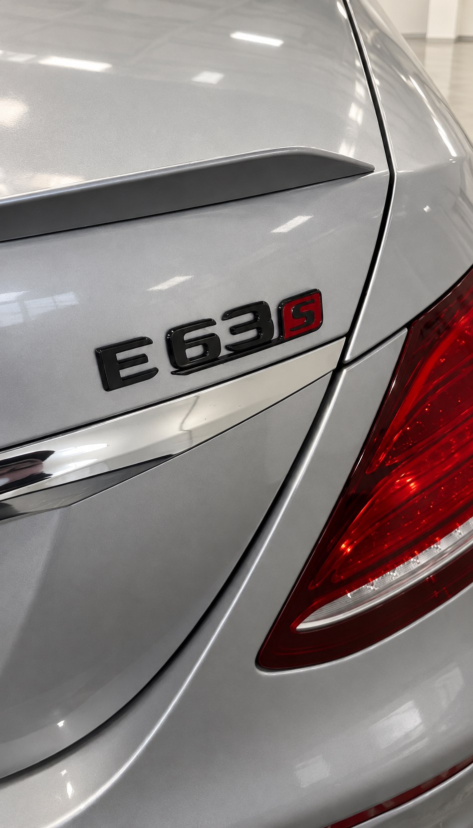 Mercedes-Benz E63 S badge in a showroom